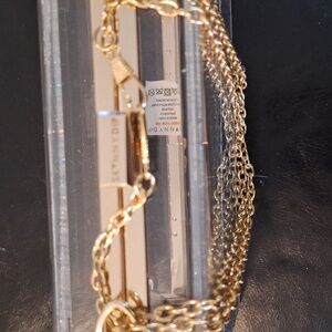 Skinny dip acrylic purse glitter magneta stars and silver glitter.